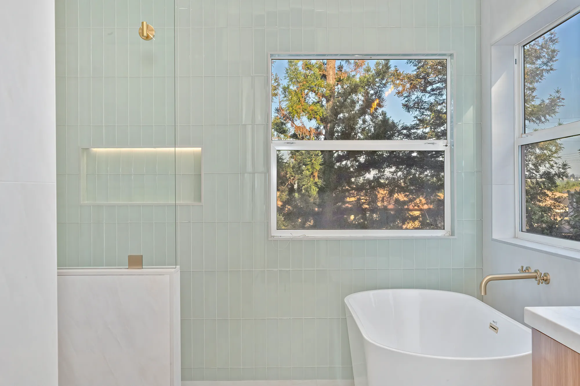 Double vanity bathroom remodel with gold hardware