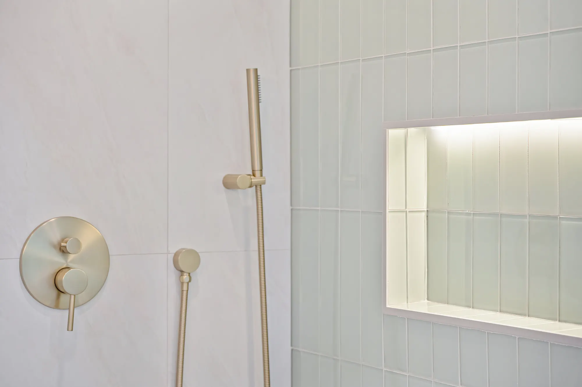 Double vanity bathroom remodel with gold hardware