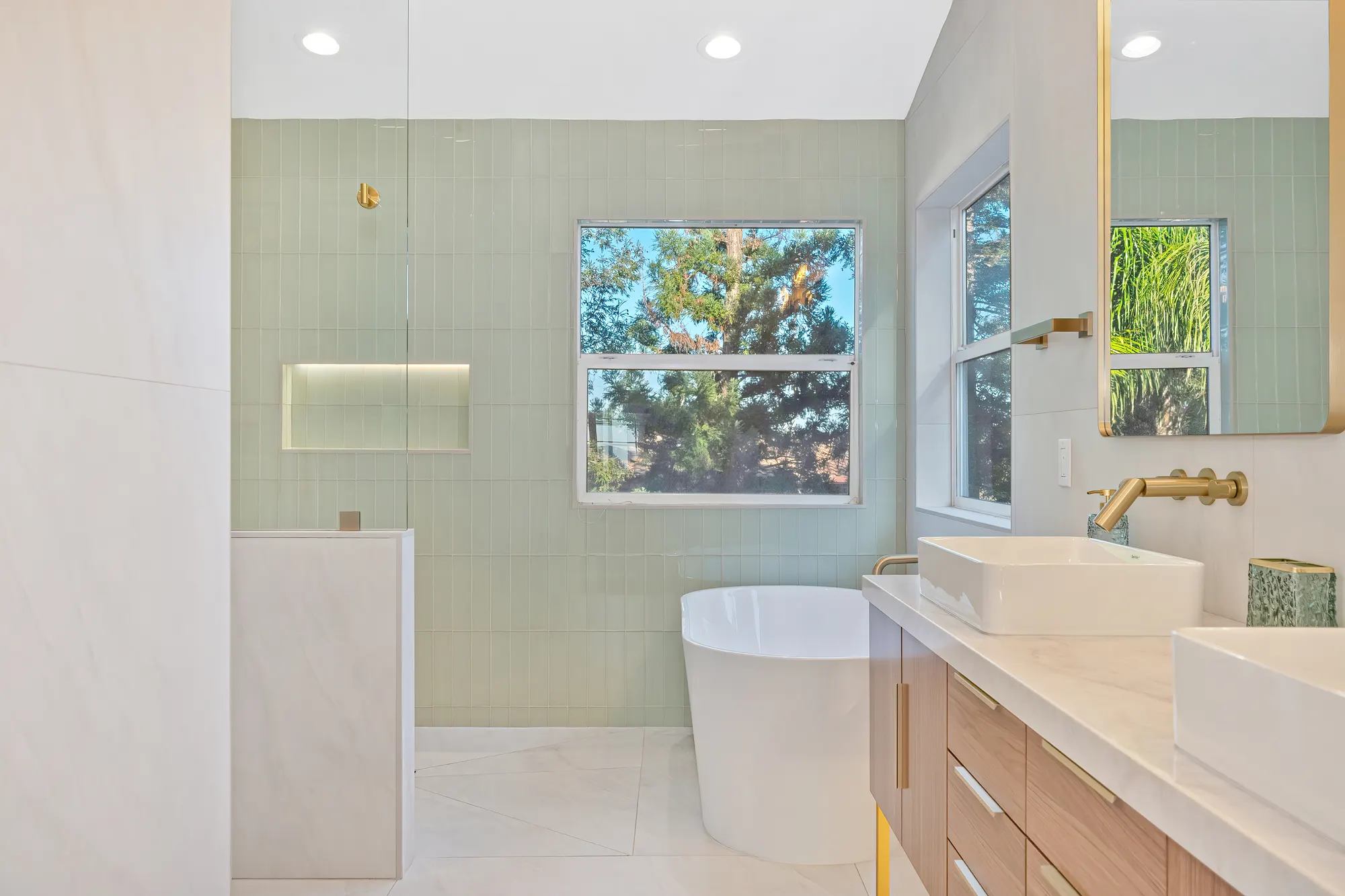 Double vanity bathroom remodel with gold hardware