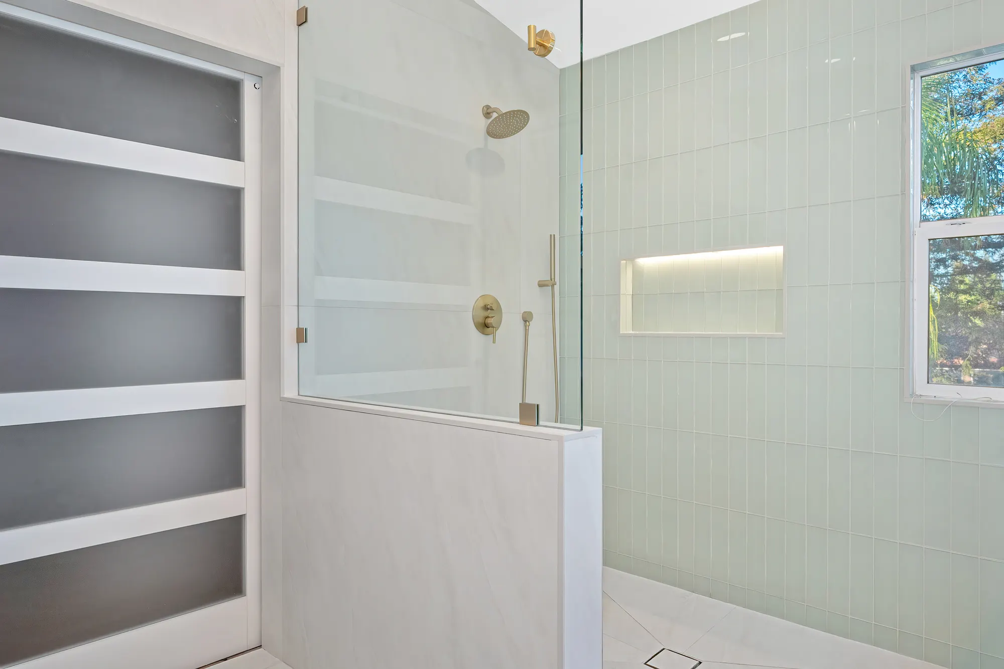 Double vanity bathroom remodel with gold hardware