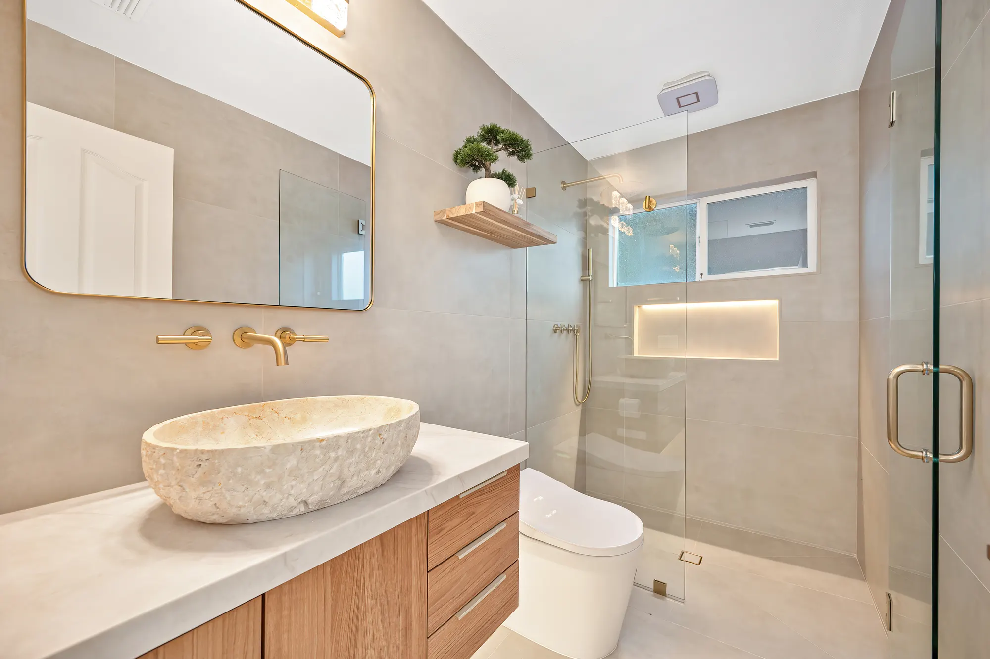 Spa bathroom with walk-in shower and custom wood vanity